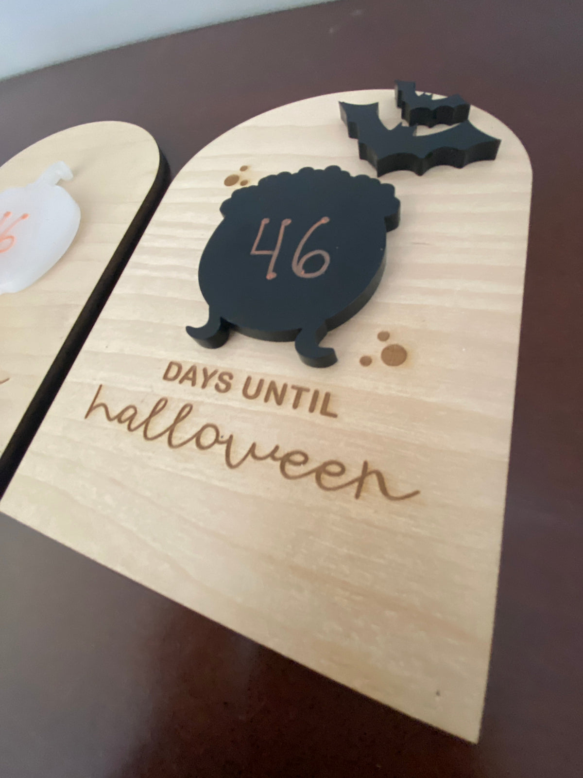 Graceful Creations by Graciela birch wood Halloween countdown sign with a black acrylic cauldron and bat detail