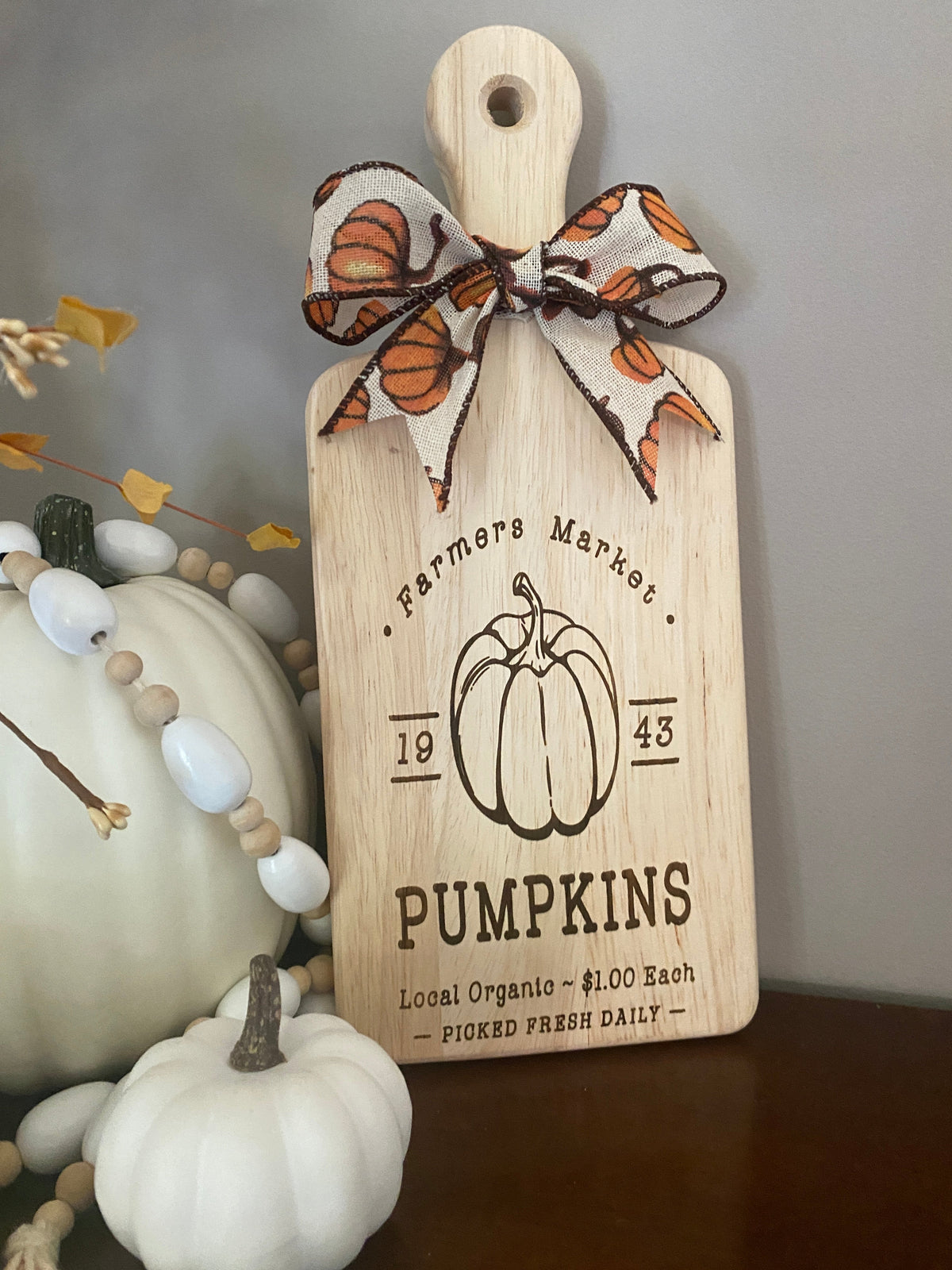 Graceful Creations by Graciela decorative wooden cutting board with pumpkin engraving and autumn themed ribbon bow